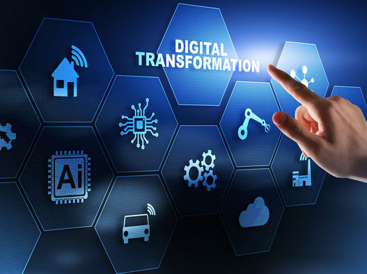 A hand points at a digital screen with hexagonal icons representing concepts like AI, cloud computing, automation, and connectivity. At the heart of this dynamic display is the phrase "Digital Transformation," signifying the shift towards a tech-driven future.